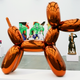 There are five original “Balloon Dogs” by Koons. This orange one, a 10-foot-high stainless steel sculpture, set the record for a living artist at Christie’s in 2013. It was purchased by an anonymous telephone bidder.